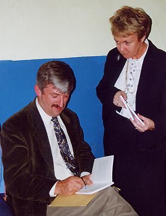 1077.  Author T. Hunt signing at History Book Launch